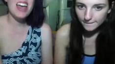 Two girls flashing on cam